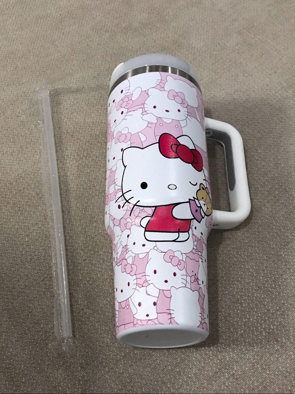 Hello Kitty stainless Steel bottle with lid and straw.